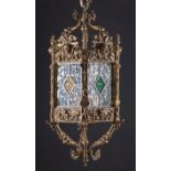 English Bronze and Leaded Glass Hall Lantern, c. 1920, hexagonal form, cast with portrait busts,