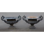 Pair of Painted Cast Iron Garden Urns, 19th c., foliate scrolled handles, leaf-molded rim, lobed