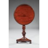 Fine Anglo-Colonial Carved Rosewood Tilt-Top Table, 19th c., circular top with egg and dart