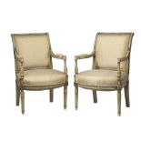 Pair of Louis XVI-Style Carved and Painted Fauteuils, 19th c., scrolled back, vasiform arm supports,