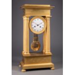 Louis Philippe Gilt Bronze Portico Clock, 19th c., rosette and palmette-decorated columns and bezel,