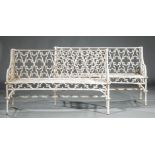 Pair of Gothic Cast Iron Garden Benches, 19th c., pierced quatrefoil seat back, downswept arms,
