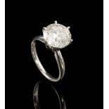 18kt. White Gold and Diamond Solitaire Ring, prong set round brilliant cut diamond, wt. approx. 5.10