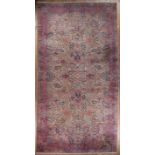 Large Semi-Antique Persian Carpet, red and cream ground, overall foliate design, 10 ft. 6 in. x 20