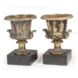 Pair of Neoclassical-Style Bronze Urns, 19th c., continuous frieze of Classical figures, black