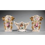 Paris Polychrome and Gilt Porcelain Three-Piece Garniture, mid-19th c., associated, incl. center