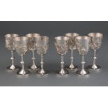 Set of Eight Silver Cordials, unmarked, each cast with dragon pursuing a flaming pearl, h. 3 7/8 in