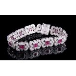 Art Deco-Style Platinum, Ruby and Diamond Flexible Link Bracelet, 44 invisible set square cut