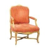 Louis XV-Style Giltwood Fauteuil, early 20th c., foliate crest rail, scrolled seat rail, X