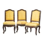 Three Régence Carved Walnut Side Chairs, 18th c., arched foliate carved crest rail, padded back