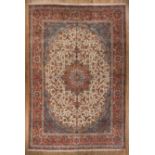 Fine Persian Esfahan Carpet, cream, blue and red ground, central medallion and spandrels, vining