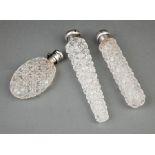Three Antique Sterling Silver-Mounted Brilliant Cut Glass Scent Flasks, late 19th c., incl. oval