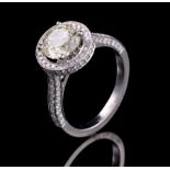 18 kt. White Gold and Diamond Ring, central prong set round cut diamond, wt. approx. 2.00 cts.;