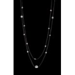 Black Rhodium Plated 18 kt. Gold and Diamond Station Necklace, cable chain spaced with 39 bezel