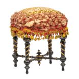 English Aesthetic Ebonized and Parcel Gilt Footstool, late 19th c., passimenterie-upholstered