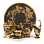 Paris Porcelain Tea Service, P.L. Dagoty, matte black ground with gilt Asian landscapes, incl.