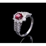 Platinum, Ruby and Diamond Ring, central prong set oval mixed cut ruby, 1.40 cts., 7.76 x 5.85 x 3.