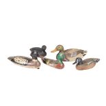 Five Carved Duck Decoys, 20th c., Southern, one marked "Norman Parr 1951", one marked "Herters mid