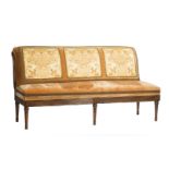 Regency-Style Carved Mahogany Settee, rolled back with reeded and boss supports, upholstery with urn
