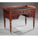 Regency Carved Mahogany Architect's Desk, early 19th c., shaped backsplash, inset leather top with