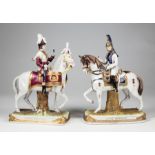 Pair of Scheibe-Alsbach Polychrome and Gilt Porcelain Figures of Napoleonic Guards on Horseback, one