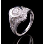 Platinum and Diamond "Unity" Ring, central bezel set round brilliant cut diamond, 1.50 cts., H