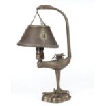 Antique Bronze Figural Lamp, figural standard, hammered shade, bird talon base, electrified, h. 17