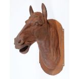 Pair of American Cast Iron Trade Signs, modeled as horse heads, h. 31 in., w. 14 in., d. 21 1/2 in