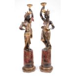 Pair of Antique Italian Carved and Polychromed Blackamoor Torcheres, male and female figures,