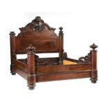 American Rococo Carved Rosewood Bedstead, mid-19th c., possibly New Orleans, headboard with cabochon