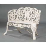 American Cast Iron Garden Bench, 19th c., scrolled crest, horse shoe motif back, pierced scrolled