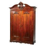 American Rococo Carved Rosewood Armoire, mid-19th c., broken-arch cornice centered by robustly