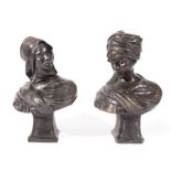 Pair of Continental Patinated Bronze Busts of Arabs, inscribed "ETRA / 13/25" on truncation, heights