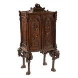 Black Forest Oak Music Stand, late 19th c., floral finial, shaped top, faux bois and fern accented