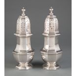 Near Pair of George III Sterling Silver Sugar Casters, London, maker CB untraced, 1787 and 1798,