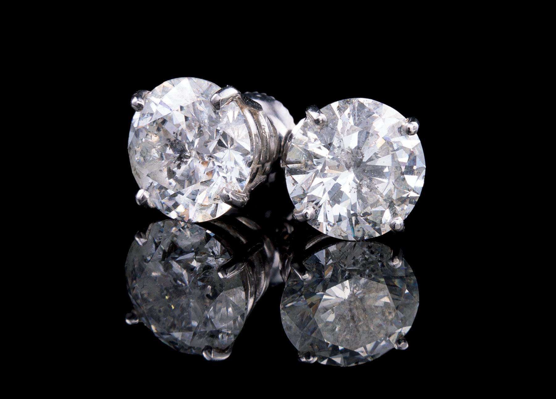 Pair of Large Platinum and Diamond Stud Earrings, 2 prong set round brilliant cut diamonds, - Image 2 of 5