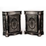 Pair of Napoleon III-Style Silvered Metal-Mounted and Ebonized Cabinets, molded marble top, frieze