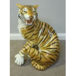 A large late 20th century Italian porcelain figure of a seated tiger, 74cm high