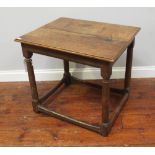 An 18th century oak side table with turned Doric supports and stretcher, 70cm, together with a