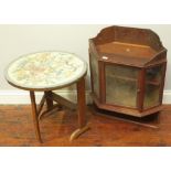 A small tilt-top table with floral embroidered top, 51cm diameter, together with a small hanging