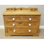 A Victorian pine dressing table, the top section with two small drawers, above two short, over two