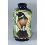 A Moorcroft RSPB pottery vase in the 'The Wanderer' pattern designed by Kerry Goodwin, with date