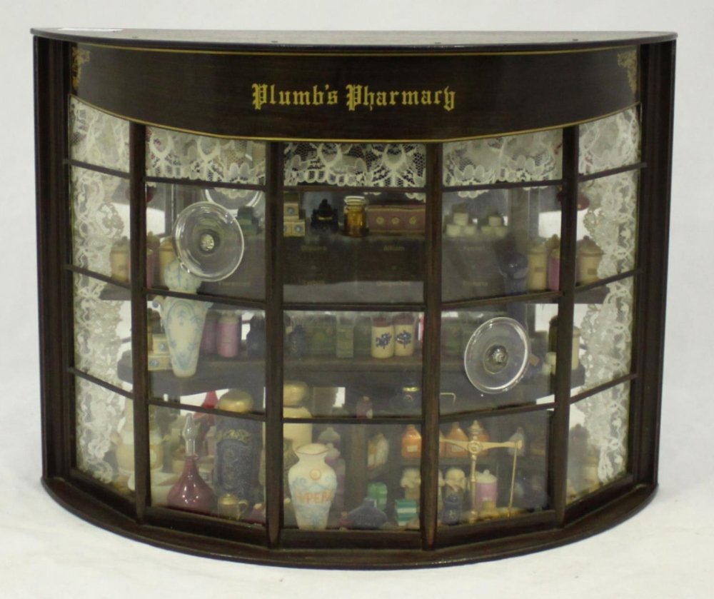 A miniature Victorian 'style' display window for Plumb’s Pharmacy, with various drug jars, scales - Image 2 of 2