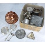 A collection of assorted silver-plated items including a three-piece tea set, assorted flatware, a