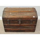 A wooden and canvas dome top trunk, with metal strap-work and locks, 77cm wide