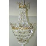 A large Neo-Classical cut-glass hanging chandelier, of baluster form, with gilt-metal frames,