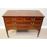 An Edwardian mahogany chest of two short and two long drawers with satinwood cross-banding and brass