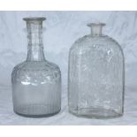 A Georgian glass decanter with repaired neck and a mould-blown flask or decanter with floral cut