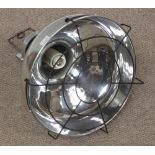 An 'Oceanic' stainless steel hanging light of inverted funnel design, 43cm high