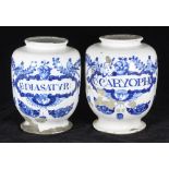 A pair of late 17th / early 18th century English delftware wet drug jars of ovoid form with flared